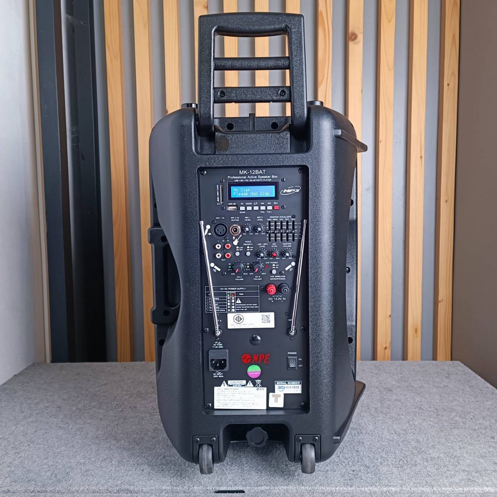 NPE ตู้ลำโพงมีแอมป์ MK-12BAT BLUETOOTH USB FM RECORD MK12 BAT พร้อมไมค์ลอย 2 ตัว มีแบตในตัวชาร์จได้ มีล้อลาก MK12BAT