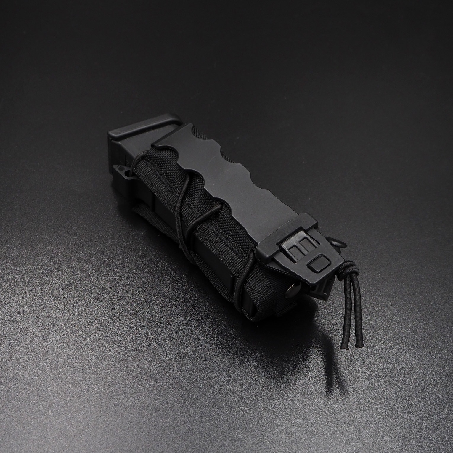 ซองแม็กกาซีนเดี่ยวทรง TACO (Wosport) Tiger Type 9mm Magazine Pouch [ MG-48 ]
