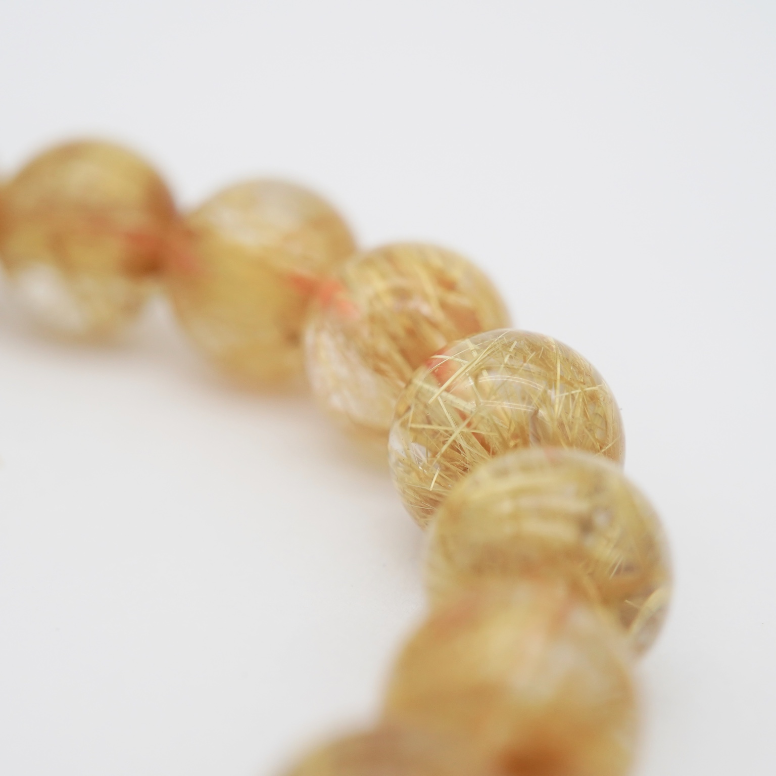 ✨ไหมทอง (Golden Rutilated Quartz) – เรียกโชคลาภ เสริมทรัพย์ พลังเสน่ห์✨