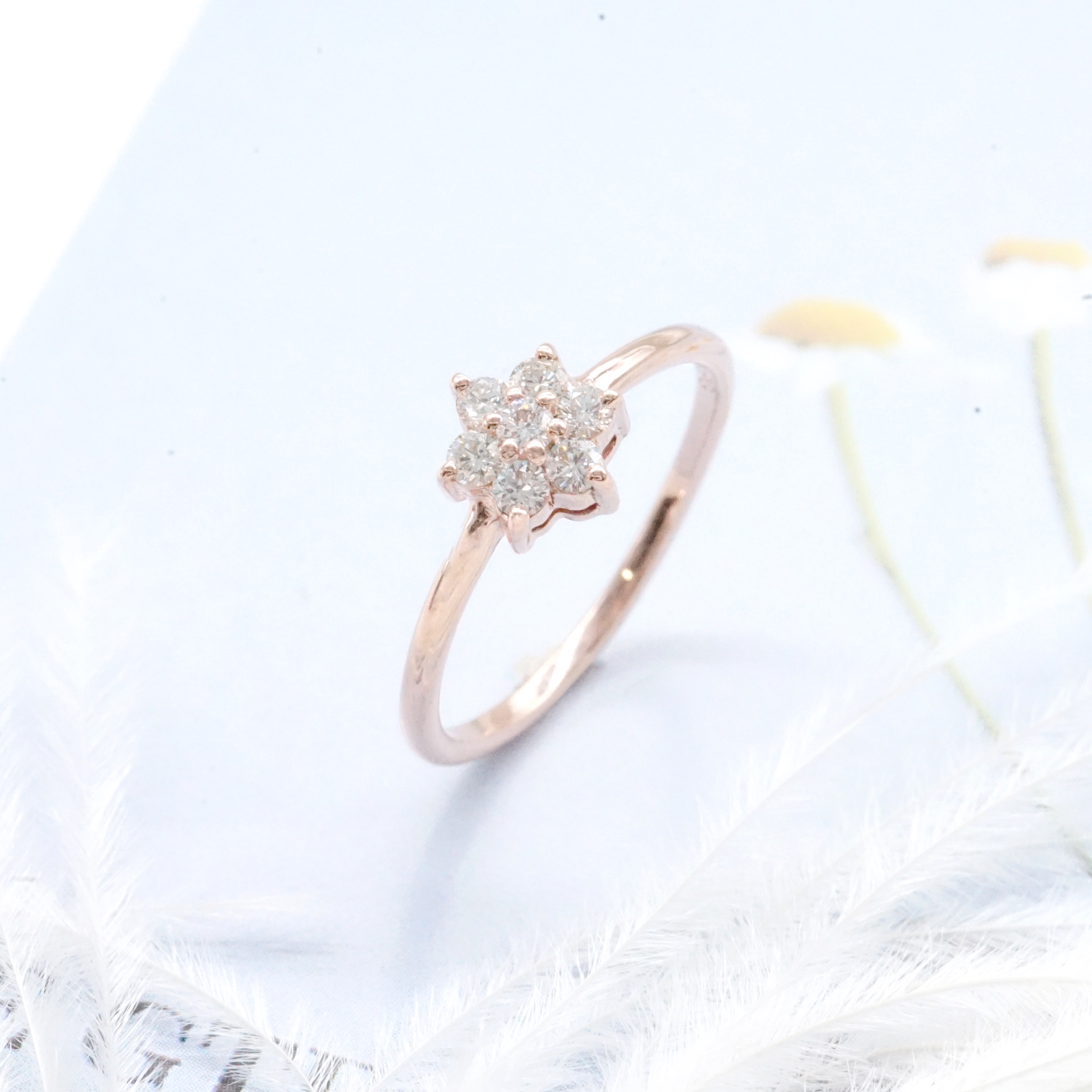 Artisan by nk - แหวนเพชร 21ตังค์ ทรงดอกไม้ ตัวเรือนรูปทรงมินิมอลและดอกพิกุลยุคโมเดิร์น