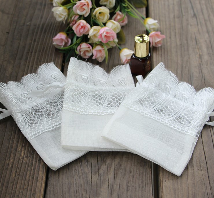 ถุงผ้าลูกไม้ สีขาวครีม ถุงผ้าใส่ของชำร่วย แบบไทย ๆ ขนาด 10x14 cm ถุงผ้าลูกไม้ สวย ๆ 919470