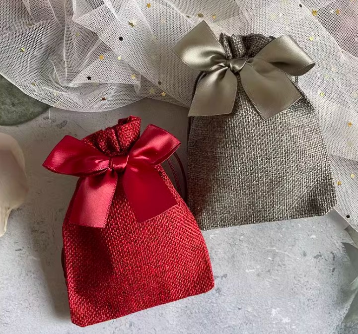 ถุงผ้ากระสอบ แบบสี ติดโบว์ น่ารัก ๆ ถุงผ้าใส่ของชำร่วย แจกงานแต่งงาน แบบสวย ๆ มาพร้อมโบว์น่ารัก 648470