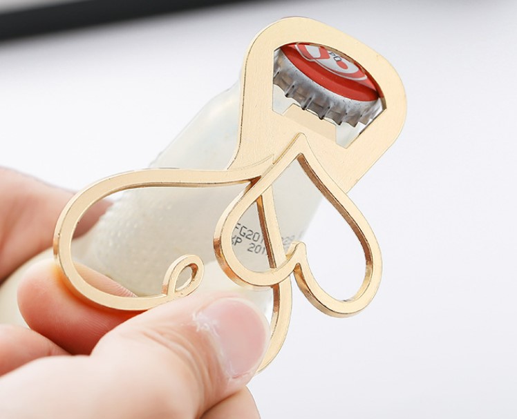 ของชำร่วยงานแต่งงาน ที่เปิดขวด หัวใจ คู่รัก สีทอง ของชำร่วย ที่สื่อ ถึงความรัก ของ คน 2 คน หัวใจไขว้กันไว้ 388875