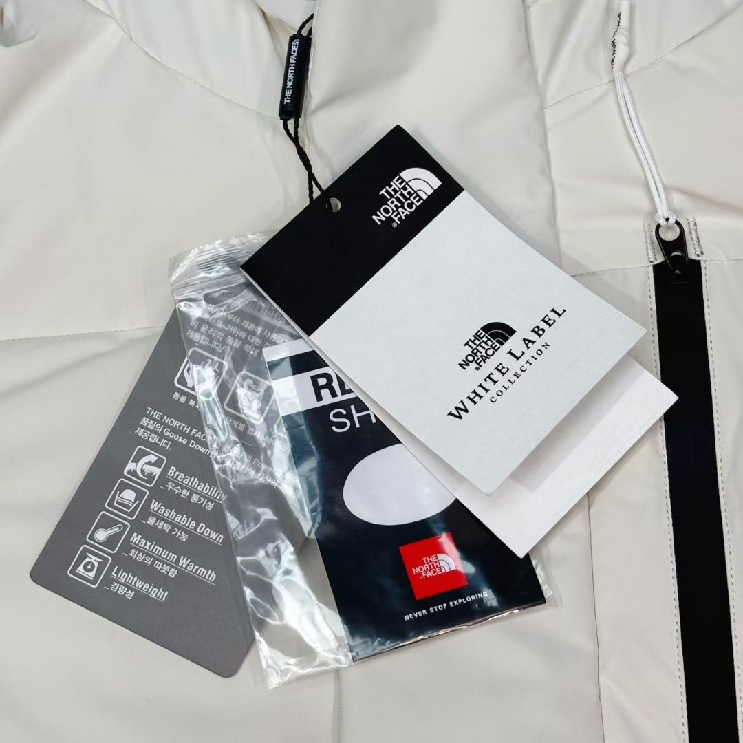 **do** เสื้อกันหนาวตัวยาว The North Face Sport Down Jacket Unisex มีฮู้ด บุด้วยขนเป็ด มี 2 สี สินค้าใหม่ ของแท้