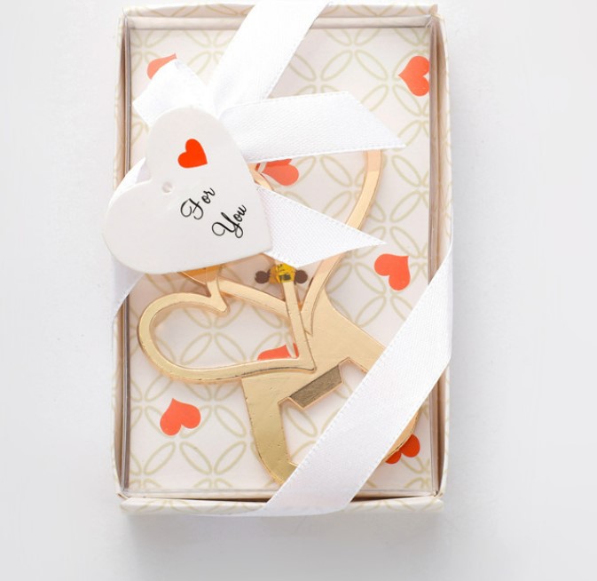 ของชำร่วยงานแต่งงาน ที่เปิดขวด หัวใจ คู่รัก สีทอง ของชำร่วย ที่สื่อ ถึงความรัก ของ คน 2 คน หัวใจไขว้กันไว้ 388875