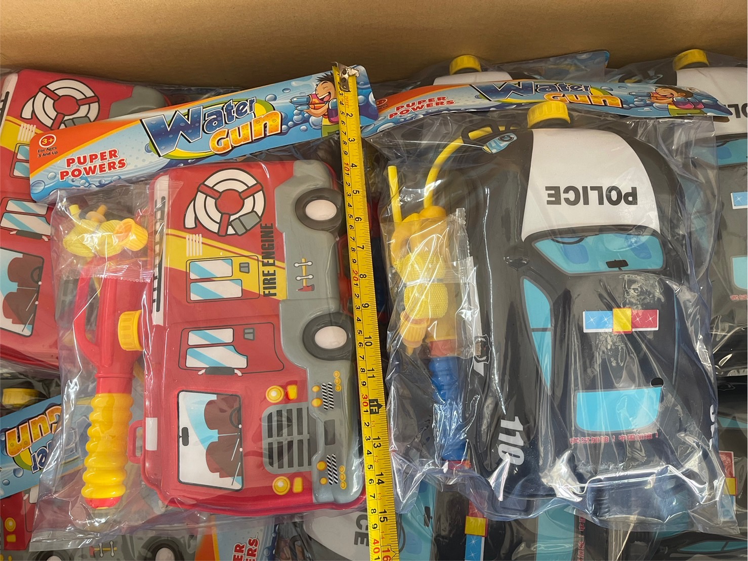 P3038 ปืนฉีดน้ำเด็กกระเป๋าเป้ลายรถการ์ตูน ปืนฉีดน้ำรถตำรวจ รถดับเพลิง ปลีกชิ้นละ (ของหมด)