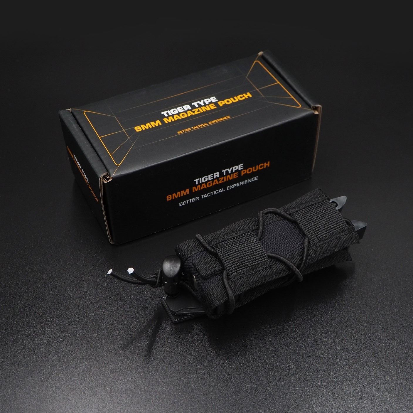 ซองแม็กกาซีนเดี่ยวทรง TACO (Wosport) Tiger Type 9mm Magazine Pouch [ MG-48 ]