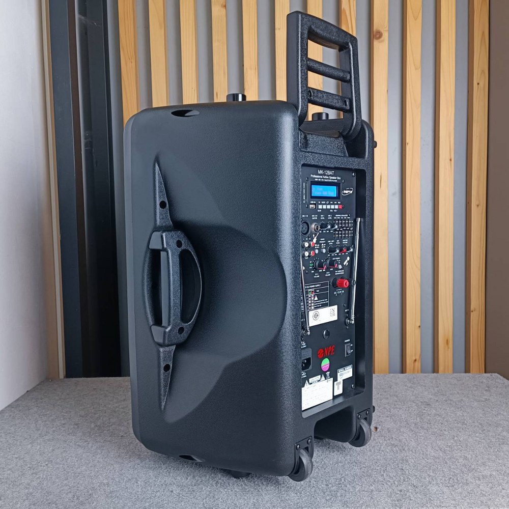 NPE ตู้ลำโพงมีแอมป์ MK-12BAT BLUETOOTH USB FM RECORD MK12 BAT พร้อมไมค์ลอย 2 ตัว มีแบตในตัวชาร์จได้ มีล้อลาก MK12BAT