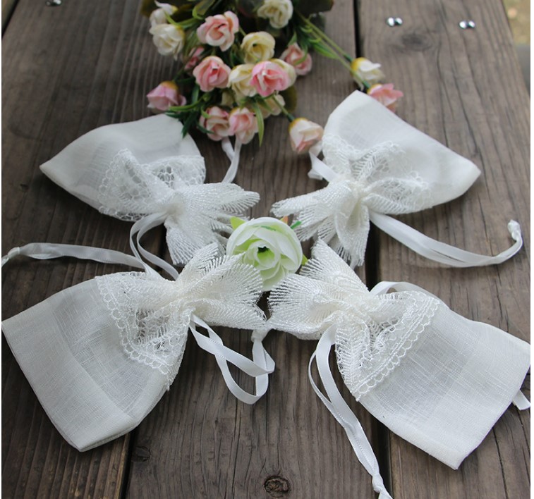 ถุงผ้าลูกไม้ สีขาวครีม ถุงผ้าใส่ของชำร่วย แบบไทย ๆ ขนาด 10x14 cm ถุงผ้าลูกไม้ สวย ๆ 919470