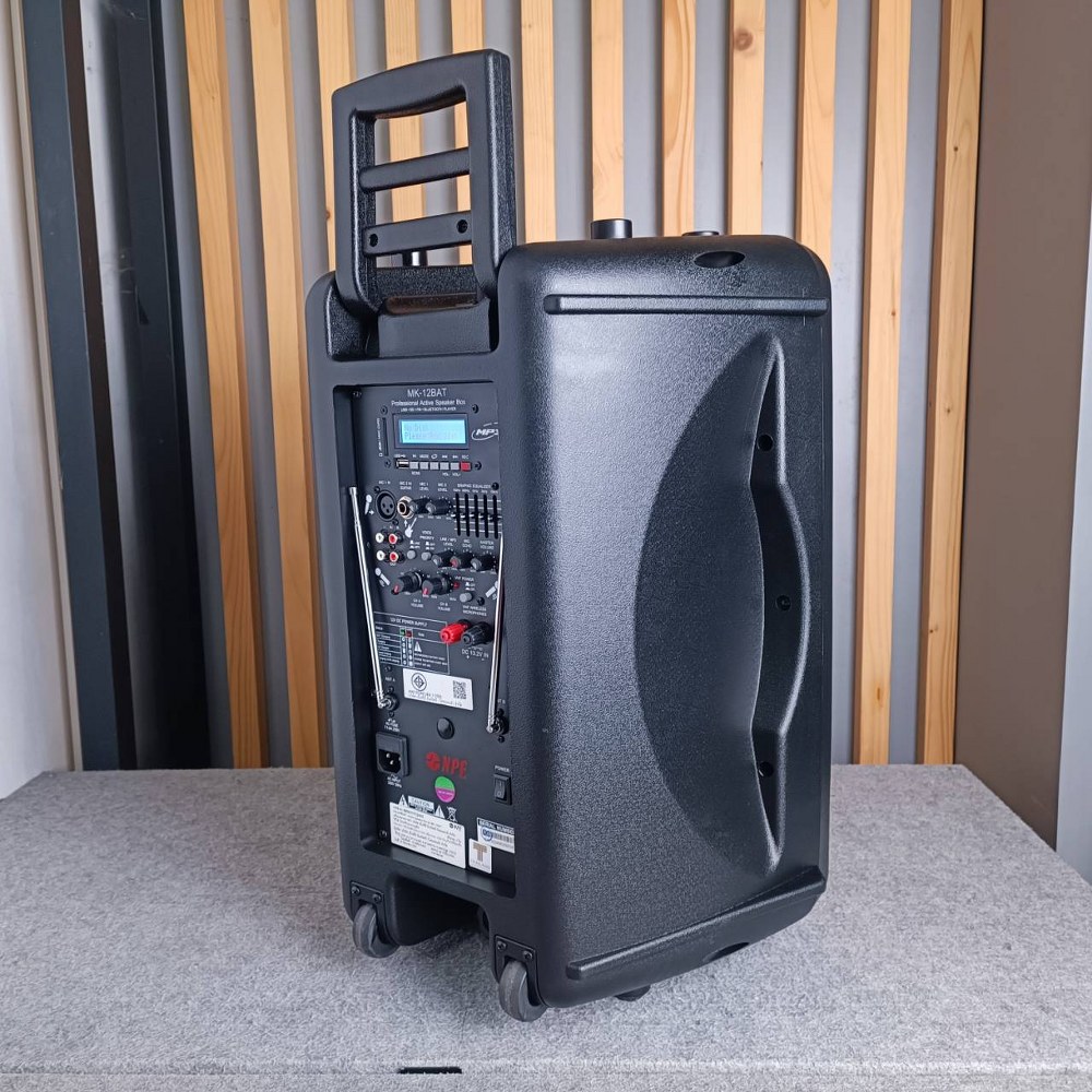 NPE ตู้ลำโพงมีแอมป์ MK-12BAT BLUETOOTH USB FM RECORD MK12 BAT พร้อมไมค์ลอย 2 ตัว มีแบตในตัวชาร์จได้ มีล้อลาก MK12BAT