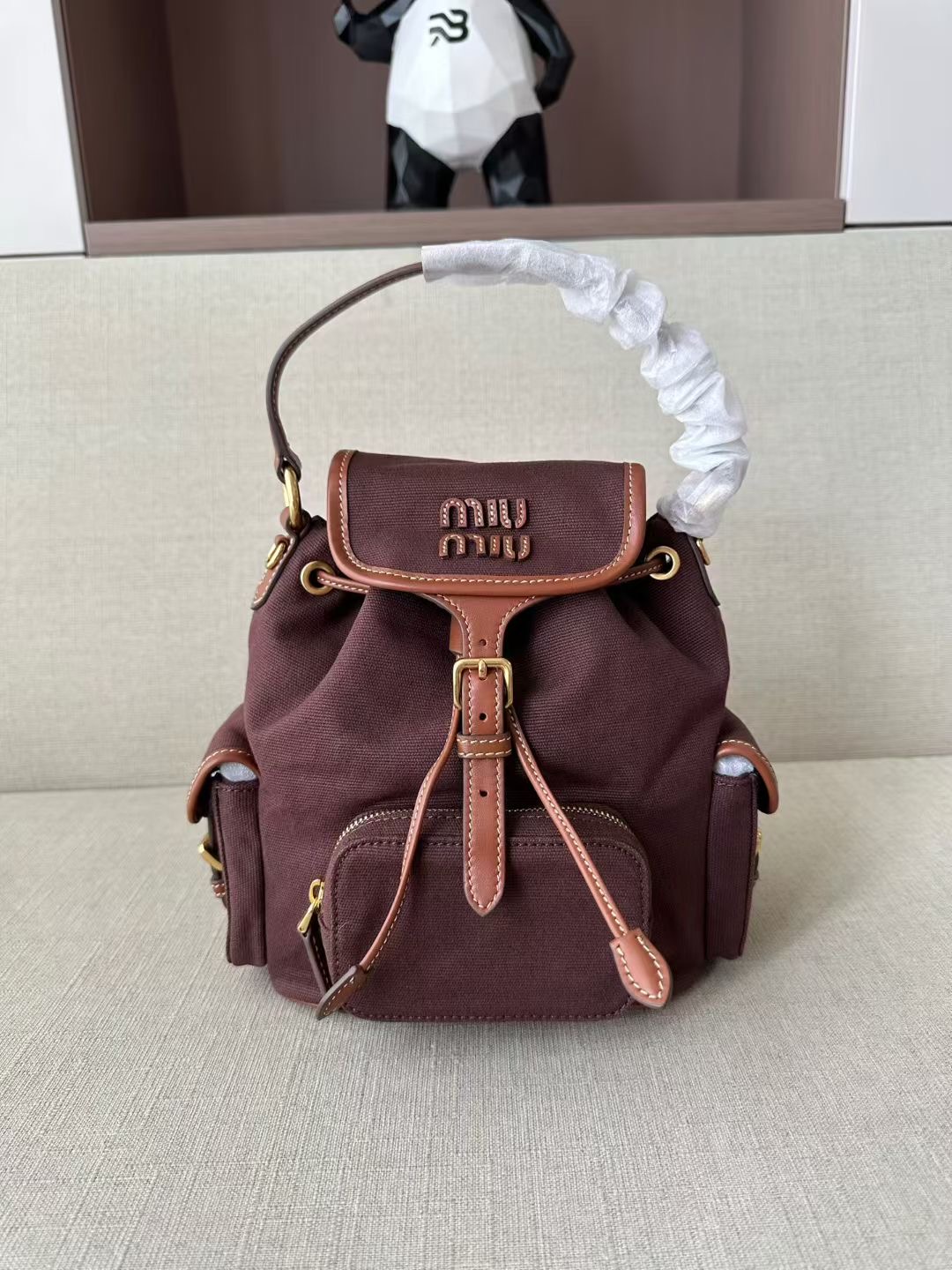 **DO** กระเป๋าเป้สะพายหลังผ้าแคนวาสและหนัง MIUMIU สินค้าใหม่ ของแท้