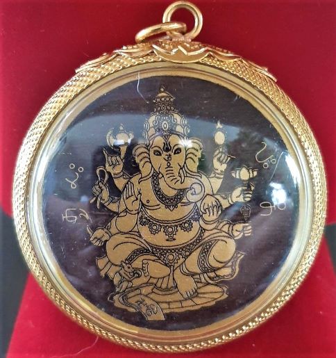 เหรียญไม้มงคลหลวงปู่ทวดหลังพระพิฆเนศ