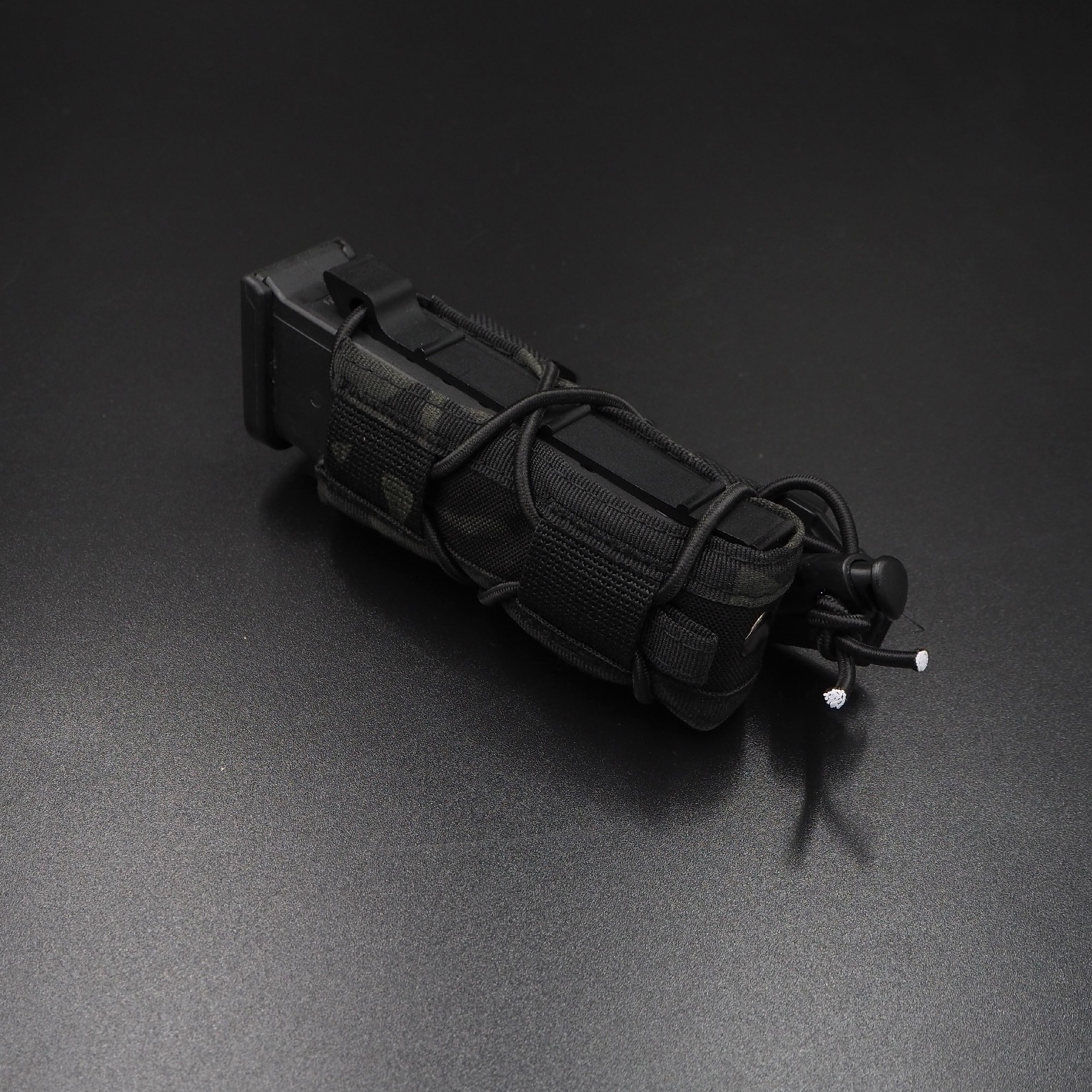 ซองแม็กกาซีนเดี่ยวทรง TACO (Wosport) Tiger Type 9mm Magazine Pouch [ MG-48 ]