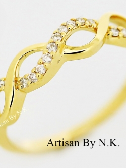 แหวนทอง 18K ฝังเพชรขนาด 1.2mm. 20 เม็ด (18K gold ring with 1.2mm. diamonds)