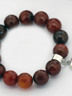สร้อยข้อมือคาร์เนเลียน (Carnelian Bracelet with silver charm)