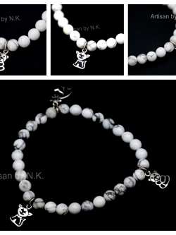 สร้อยข้อมือหินโฮวไลท์ประดับด้วยจี้เงิน (Howlite bracelet with silver pendant)