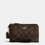 พร้อมส่ง กระเป๋าสตางค์ Coach Double Corner sip in signature