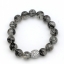 สร้อยข้อมือ ไหมดำ(Black Rutilated Quartz) ขนาด12มิลลิเมตรคั่นด้วยลูกปัดเงินฝังเพชรCZ